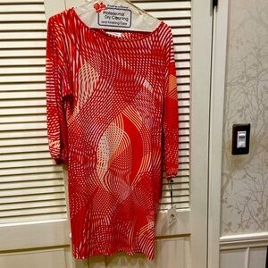 New with tags, Calvin Klein dress! Orange, pink and white. Split sleeves.